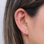 Pendiente labret espirales con esmeralda - Helix Body Jewelry - Tienda Online de Piercings