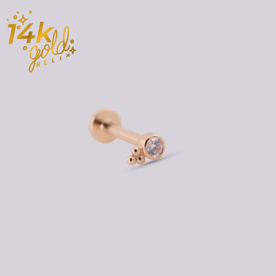 Tragus piercing oro 